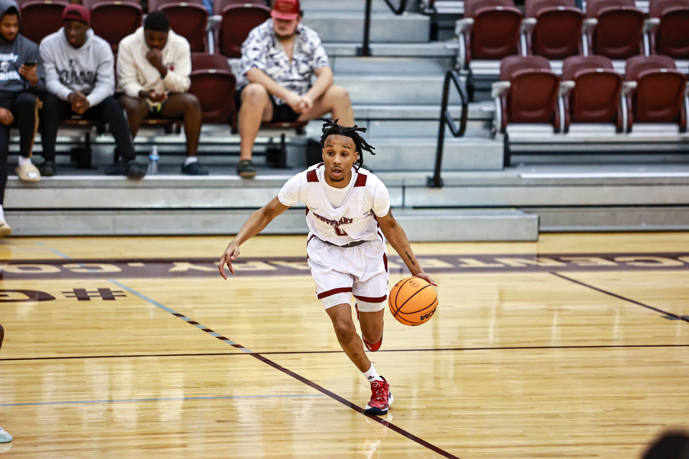 Senior G Craig Collier led all scorers with 20 points in the Gents' win on Friday.

PHOTO: Isabell Gonzales