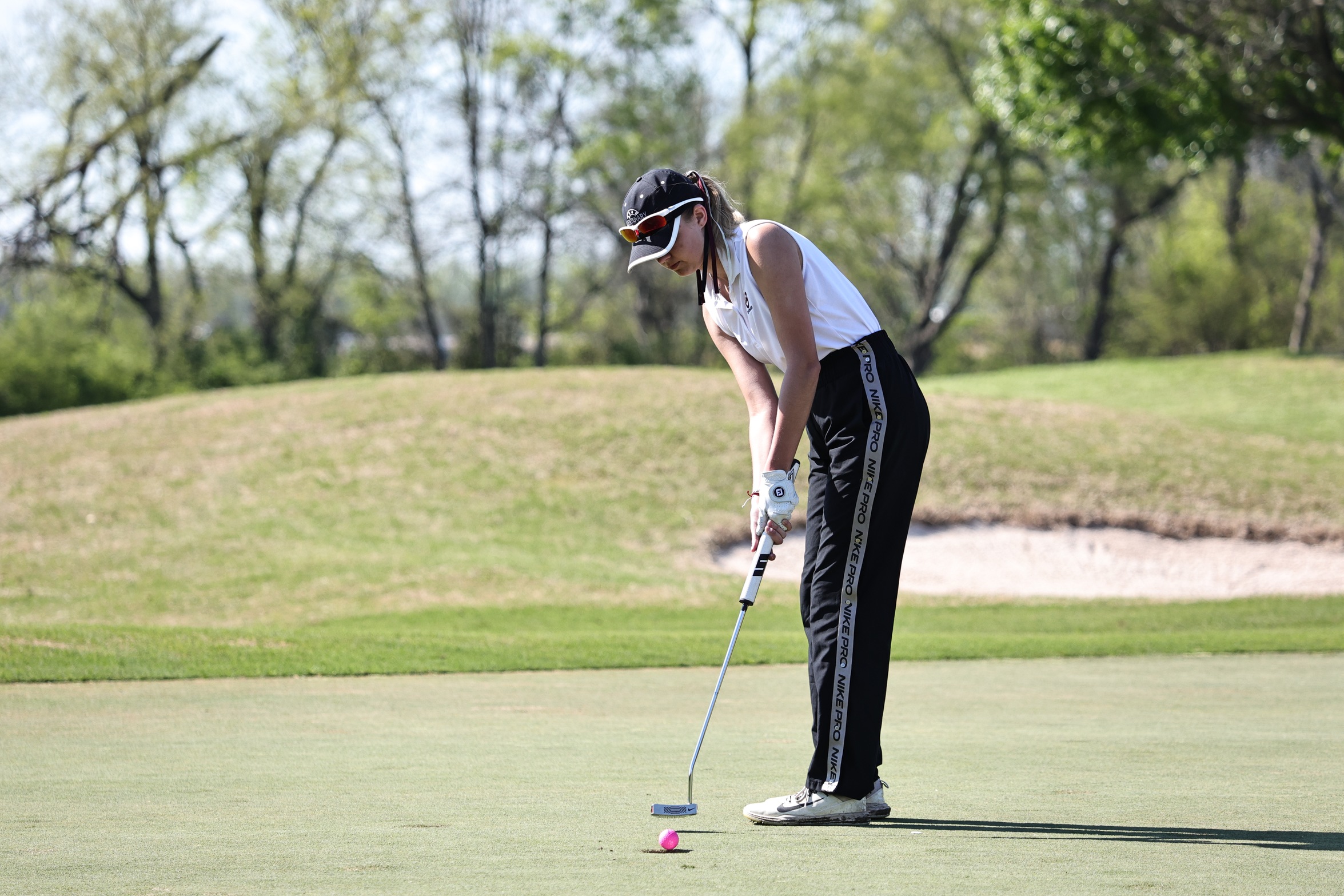 Sophomore&nbsp;Jordyn Templeton&nbsp;(Columbus, Texas) and the Ladies tee off at Cypress Bend Resort on Monday.